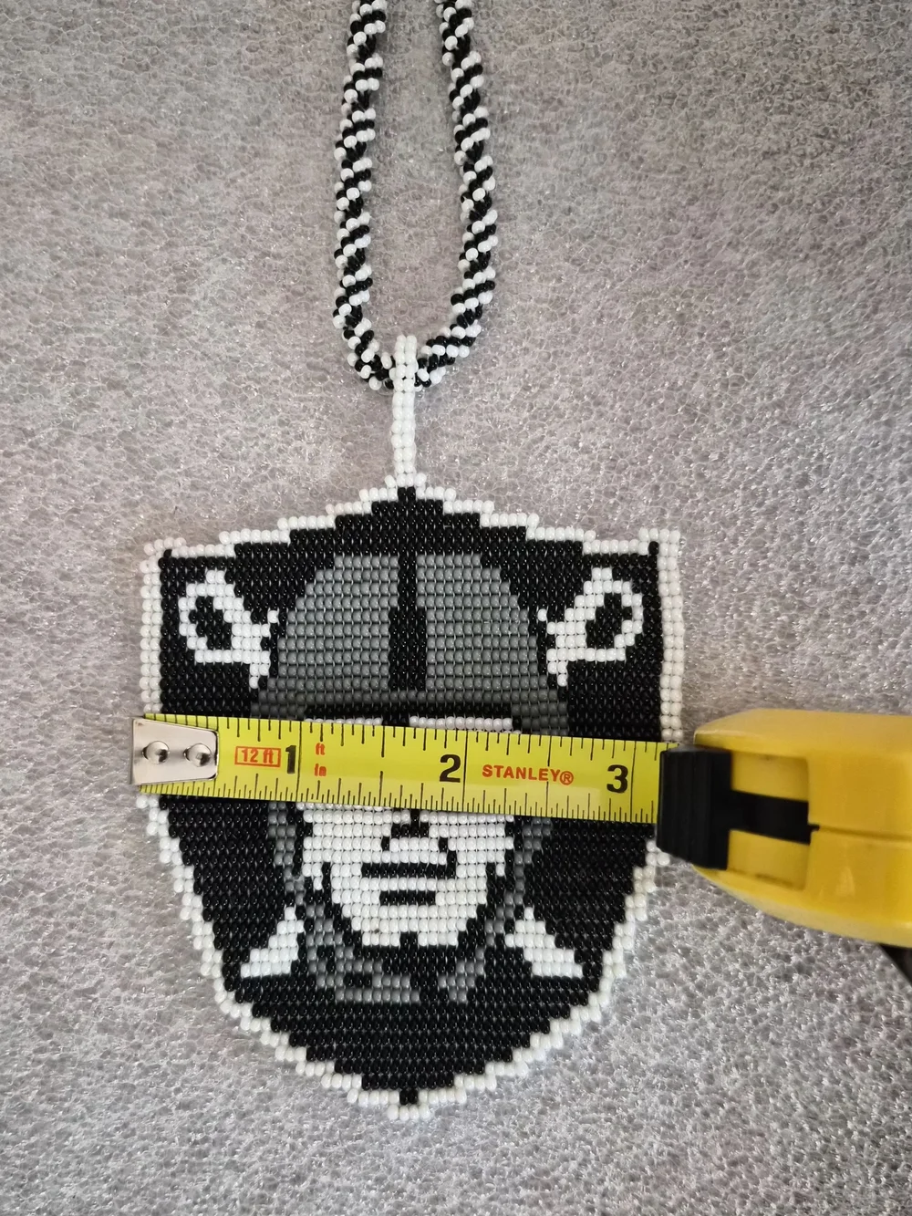Hand Made Black and White Raiders Beaded Shield